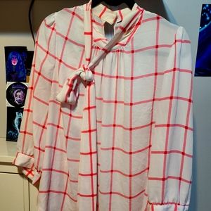 Striped blouse with tie in the front.